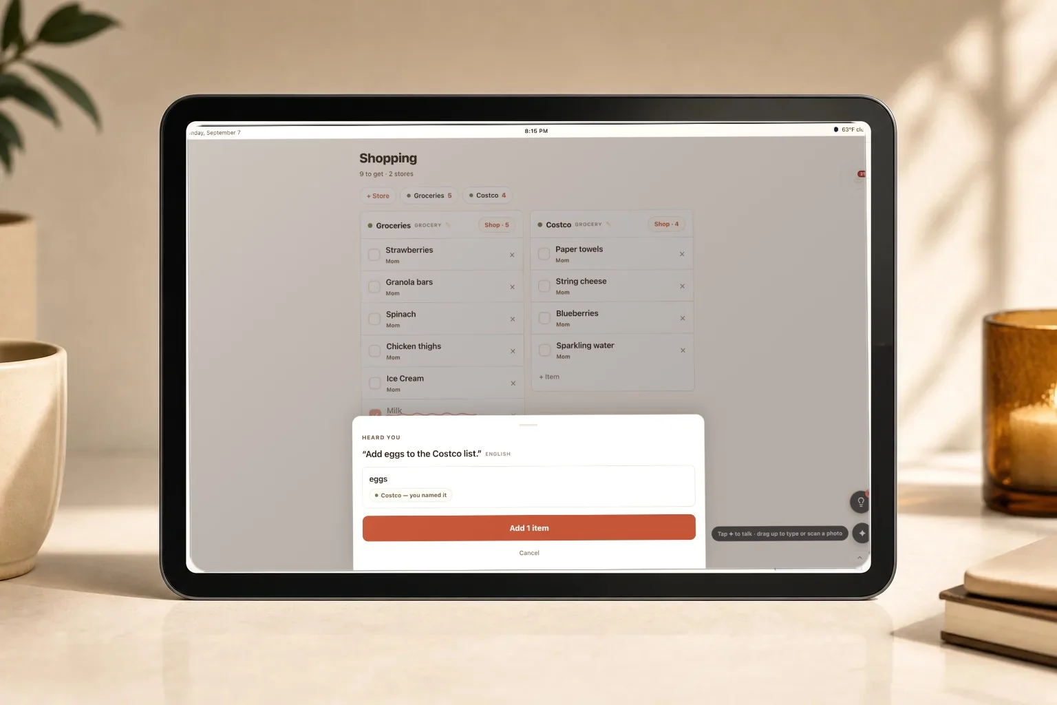 A tablet showing FamGlow repeating back a spoken request, "Add eggs to the Costco list", with an Add 1 item button
